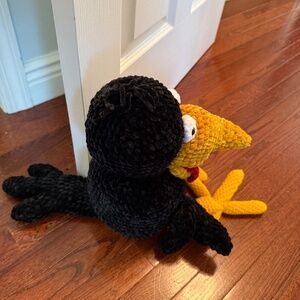 Velvet soft squished crocheted black bird door stop